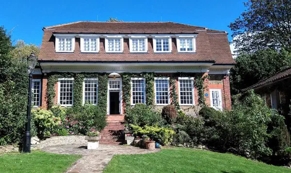The front exterior of One Oak, a Grade II listed Arts and Crafts house in Hampstead
